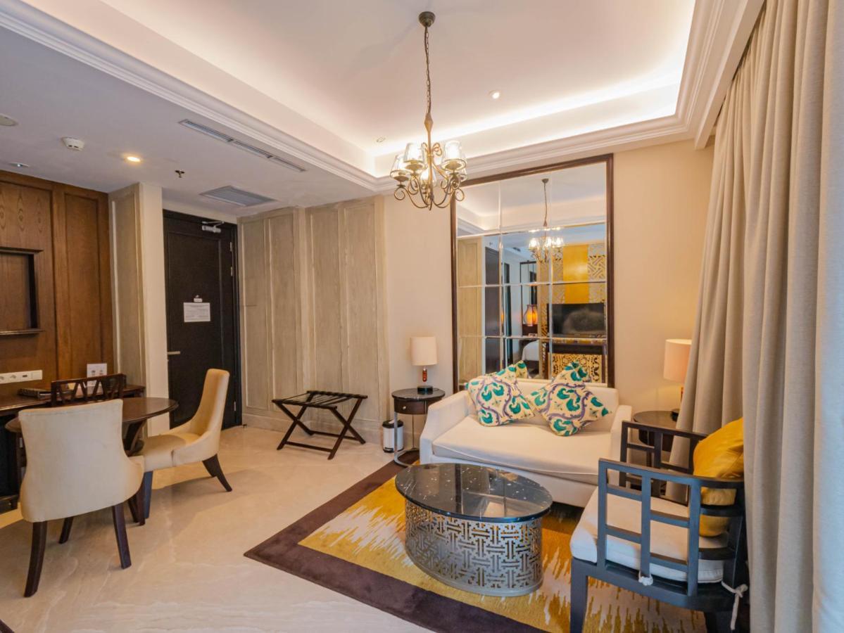 ジャンブルウック オセアノ スミニャック ホテル エクステリア 写真 A living room in a suite at the hotel